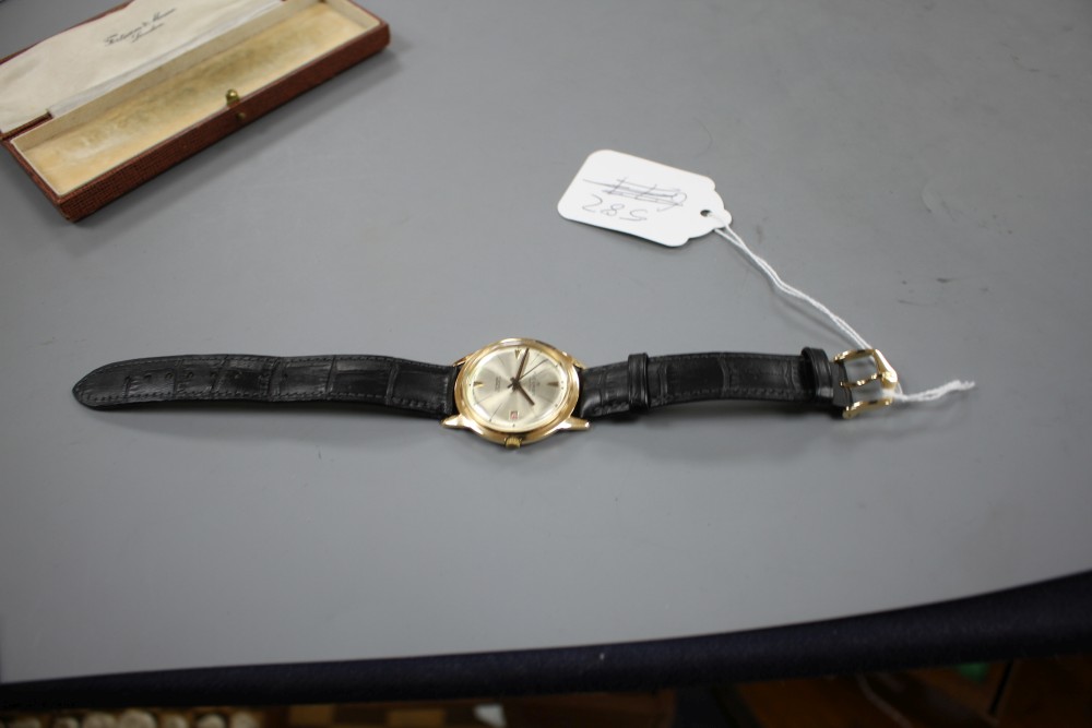A gentlemans Swiss 18k yellow metal Fleurier automatic wrist watch, with later associated leather strap.
